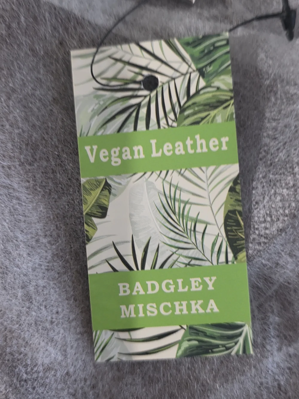 Badgley Mischka Green and White Vegan Leather Tag